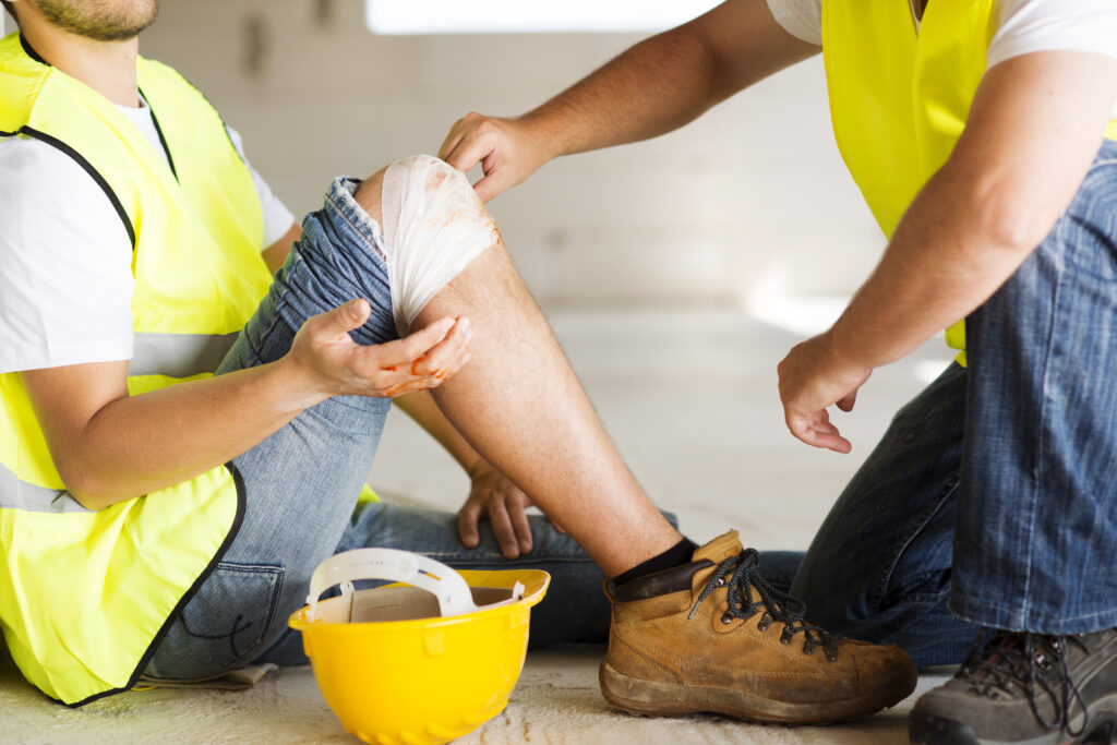 construction worker with injured knee