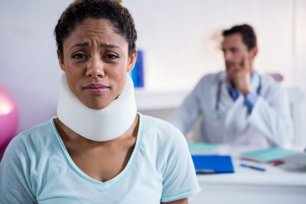 woman wearing neck brace